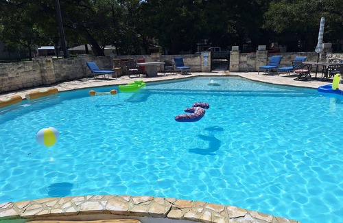 Seguin House | Large Mediterranean pool, river, basketball, sleeps 26, 8 bedrooms