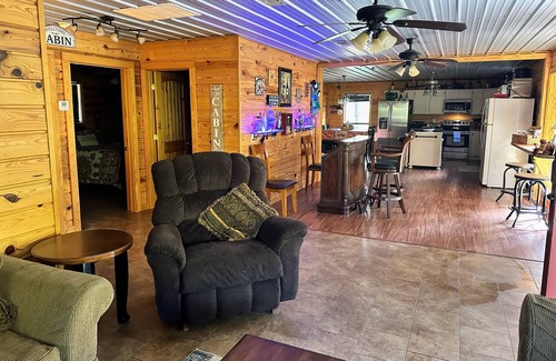 Murfreesboro Cabin | Large Riverfront family cabin. Within minutes of Diamond Mine and lake