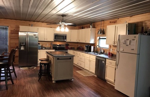 Murfreesboro Cabin | Large Riverfront family cabin. Within minutes of Diamond Mine and lake