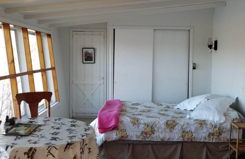Baddeck Bridge Cottage | Large Secluded Riverside Cottage