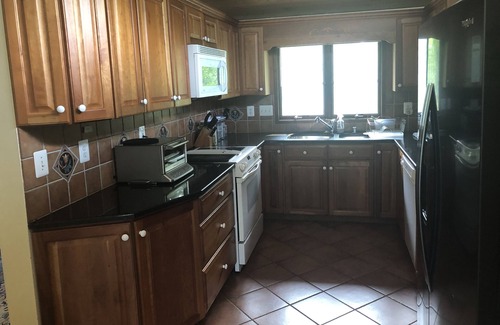 Cape St. John House | Large secluded/wooded 4 bedroom home with waterview!