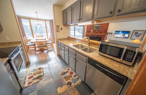 Lakeside Village Condo | Large Studio with Updated Kitchen and free shuttle