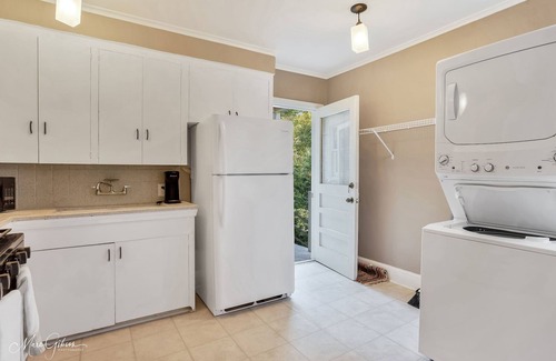 Caddo Heights-South Highlands Apartment | Large windows overlooking streets of historic South Highlands makes this cozy!