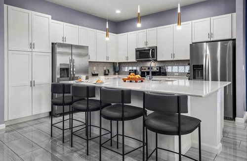 Loughman House | Lavish Villa Near Disney w/Space & Sea Themed BRs, Theater, Arcade & Game Loft