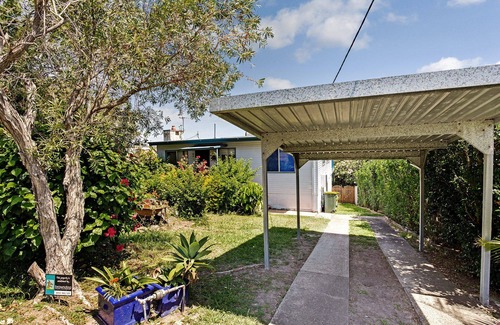 Black Head House | Lazy Dayz allows you to relax while enjoying the sunshine and the salty air.