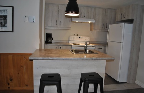 Sutton Apartment | Le Montagnard – Auberge/Hôtel & chalets