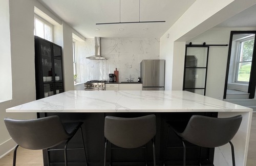 Le Claire House | LeClaire historic stone house with modern updates, river views and large yard