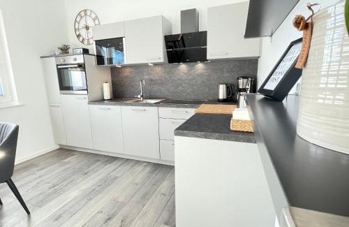 Wremen Apartment | Lee-Moderne Neubauwohnung in Strandnähe - Wallbox