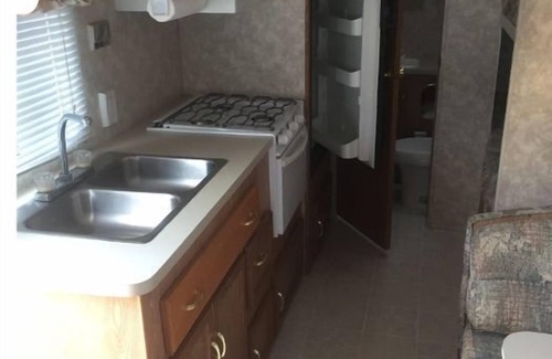 Red Deer House | Let’s go camping. 25 ft Travel Trailer for rent. Delivery only.