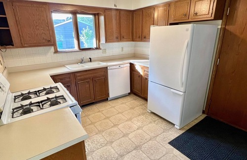 New Hope House | Light Filled Fresh and Clean Corner Lot Mid Century Home with Easy City Access