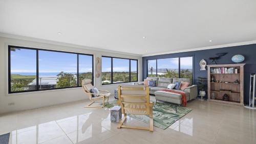 Emerald Beach House | Lighthouse at Emerald Beach - Ocean Views, walk to beach