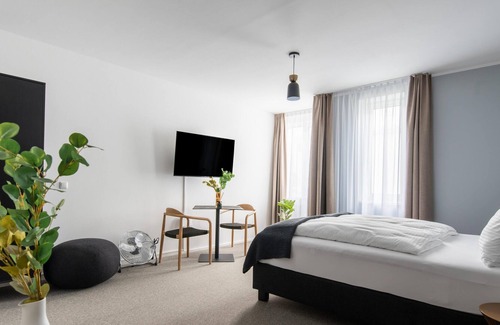Innere Stadt Apartment | limehome Linz Friedrichstr | Suite XL seating area