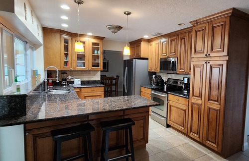 Apollo Beach House | Live the Waterfront Dream: Pool, Dock, Kayaks & Paddleboards Await!