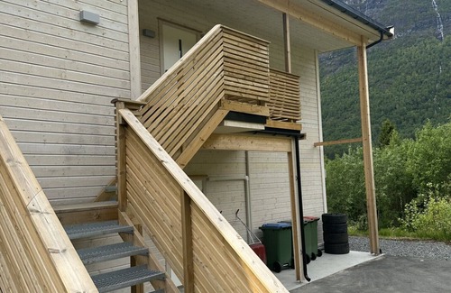 Loen Apartment | Loen Panorama in Stryn, outdoor hot tub with fjord and mountain views