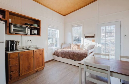 Stanton Cabin | Loft bedroom (Q), extra sleeping in living area, full bathroom with shower and tub, pet frendly