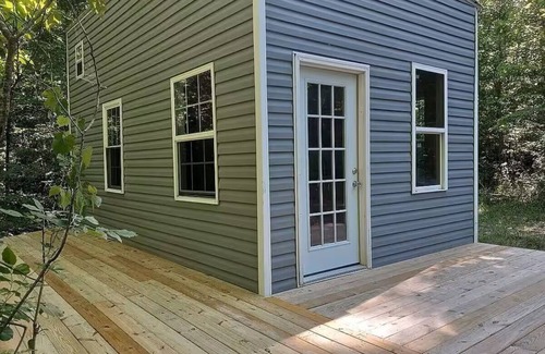Stanton Cabin | Loft bedroom (Q), extra sleeping in living area, full bathroom with shower and tub, pet frendly