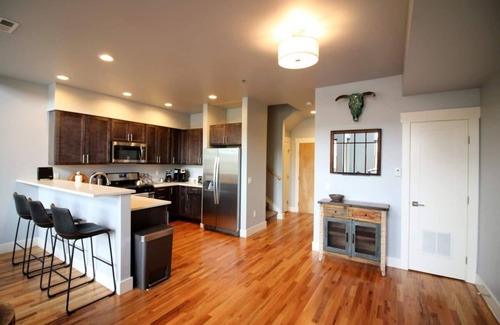 Salida Condo | Lofted condo on the boat ramp, downtown Salida, king bed plus super comfortable queen murphy bed and sleeper sofa. Two levels, two bathrooms, parking spot in garage included.