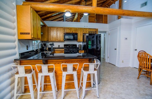 Seguin Cabin | Log Cabin | Guadalupe River | Kayaks | Ping Pong