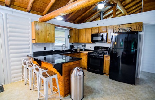 Seguin Cabin | Log Cabin | Guadalupe River | Kayaks | Ping Pong