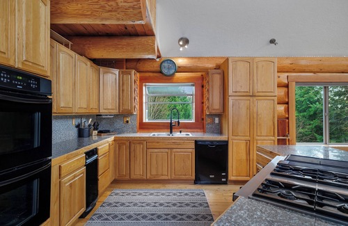 Shelton Cabin | Log Cabin in the Woods. On five acre lot in the woods pet friendly.