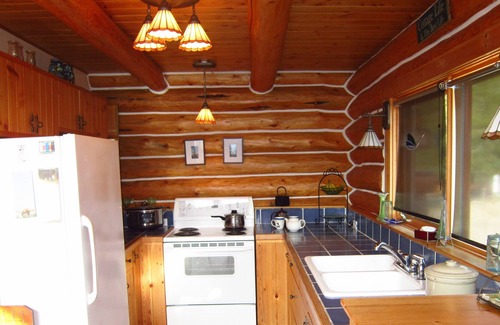 Gray Creek Cabin | Log Cabin Perched on East Shore Kootenay Lake