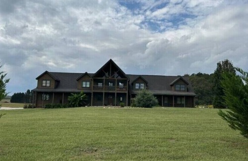 Bowdon Junction House | Log Castle and a Spring Fed Lake