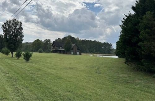 Bowdon Junction House | Log Castle and a Spring Fed Lake