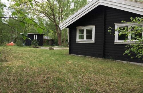 Nykobing Sjaelland House | Log House Near A Child-Friendly Sandy Beach