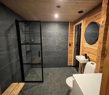 Yllasjarvi House | Logcabin, sauna, fireplace, view, kitchen