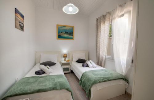 Koutsi Villa | Loggos Seaview Cottage with Private Pool by Konnect