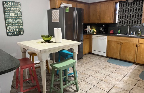 Longview House | Longview family neighborhood., Fenced yard , Equipped for long stays.
