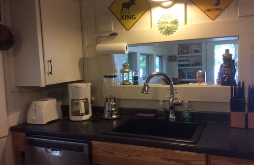 Oquossoc House | Loon Camps at Waters Edge - Two cute cottages are connected by a screened porch
