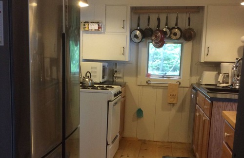 Oquossoc House | Loon Camps at Waters Edge - Two cute cottages are connected by a screened porch