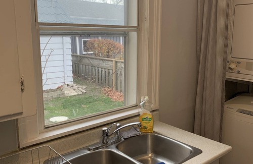 Newmarket Apartment | Lotus Landing: tranquil main level unit in quaint home w/fireplace, deck & yard