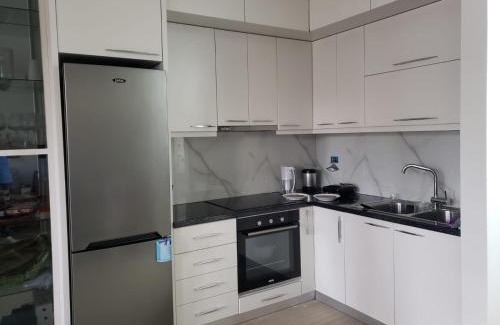 Ishem Apartment | Lovely 1-Bedroom Apartment at San Pietro Beach Front Resort