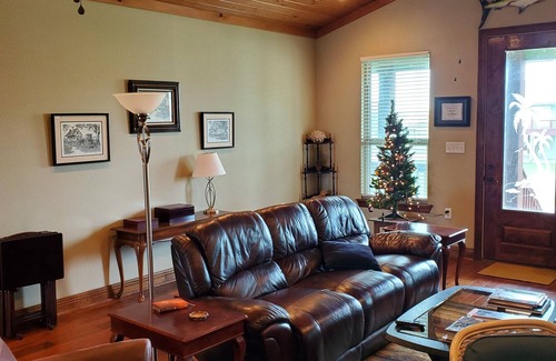 Hackberry House | Lovely 4-bedroom elevated house with Front and Back Porches, on a canal