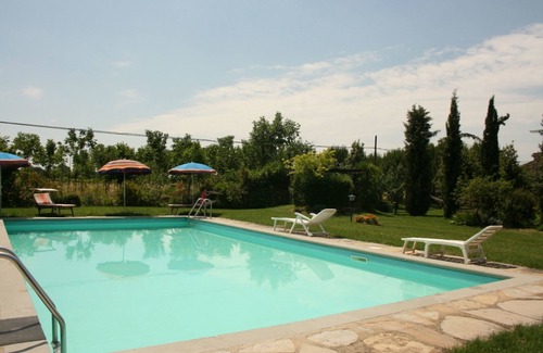 Castiglion Fiorentino Apartment | Lovely apartment for 4 guests with pool, WIFI, TV, pets allowed and parking, close to Cortona