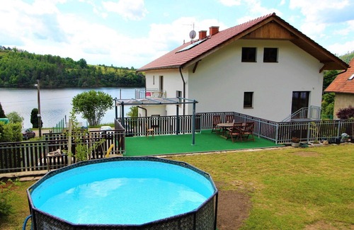 Zupanovice Apartment | Lovely apartment for 5 people with WIFI, pool, TV, patio, pets allowed and parking