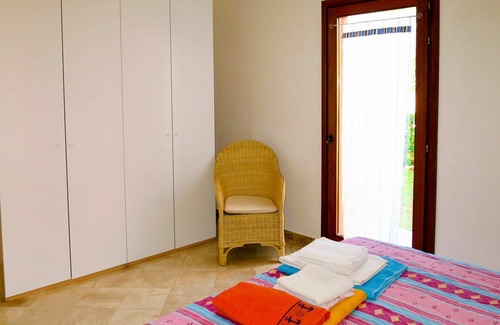 Porto Pozzo Apartment | Lovely apartment for 4 guests with pool, WIFI, A/C, terrace, pets allowed and parking