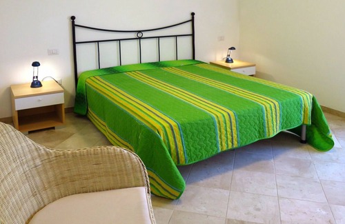 Porto Pozzo Apartment | Lovely apartment for 4 guests with pool, WIFI, A/C, terrace, pets allowed and parking