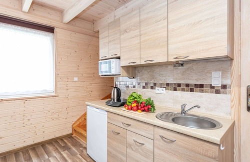 Lubiatowo House | Lovely apartment in villa for 4 guests with pool, patio, pets allowed, panoramic view and parking