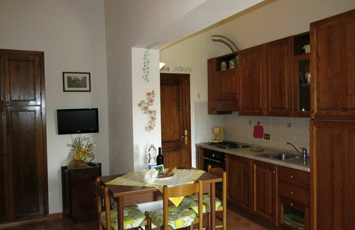 Lajatico Villa | Lovely apartment in villa for 2 people with pool, WIFI, TV and patio