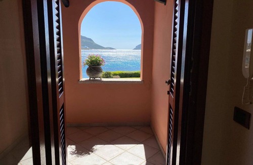 Baia Caddinas Apartment | Lovely apartment for 6 guests with A/C, pool, WIFI, TV, terrace, pets allowed and parking