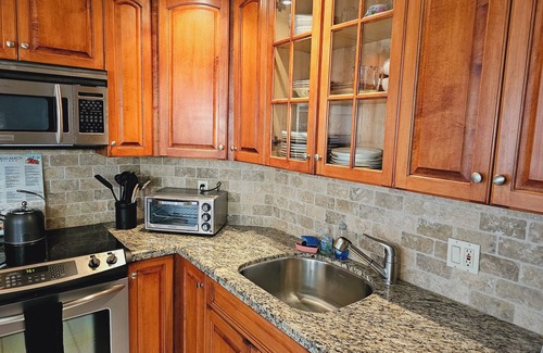 Galt Mile Condo | Lovely Beachfront Condo overlooking the Ocean, private jacuzzi, balcony & pool