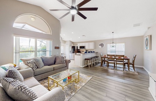 Westbury House | Lovely home with a heated pool, open-concept interior, central AC, and W/D