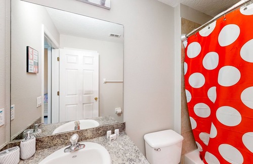 Westbury House | Lovely home with a heated pool, open-concept interior, central AC, and W/D