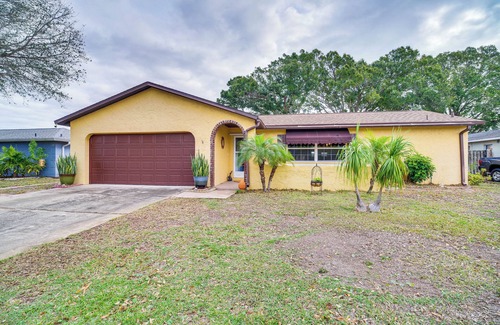 Surfside Estates Cottage | Lovely Merritt Island Home w/Kayak + Fire Pit!