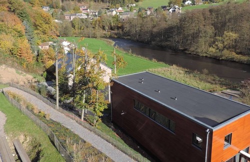 Coo House | Lovely modern cottage with sauna, bubble baths and even a beach on the river!