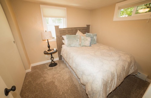 Rimrock House | Lower level sunlit rooms