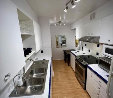 L'Amoreaux Apartment | Lower Penthouse Suite with Pools & Sunset Views